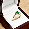 Engagement ring i055SmDi in Gold with Emerald and Diamonds