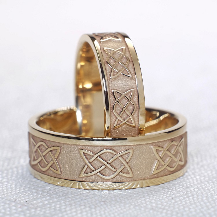 Wedding rings v1201 in Gold or Platinum with Celtic Knot Laser Pattern