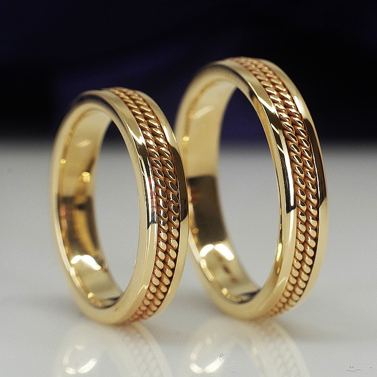 Wedding rings v1272 in gold with double manual braiding