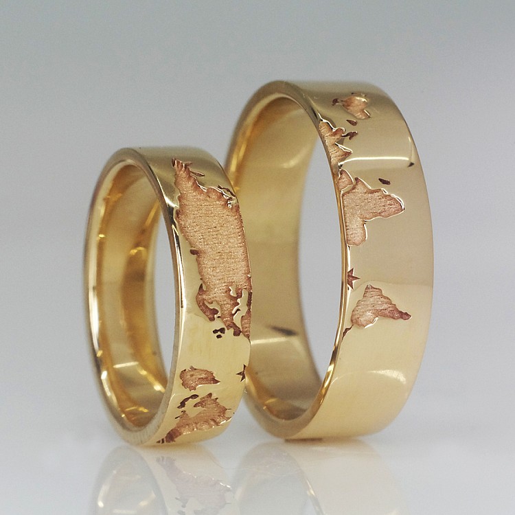 Wedding rings v1366 in Gold or Platinum with a World Map pattern