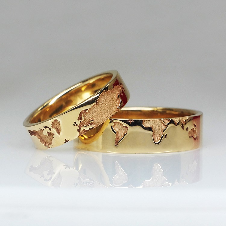 Wedding rings v1366 in Gold or Platinum with a World Map pattern