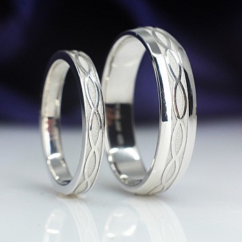 Wedding rings v1557 in Gold or Platinum with Infinity Pattern