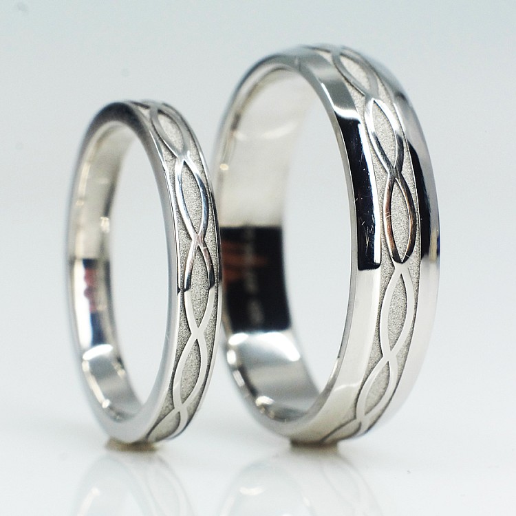 Wedding rings v1557 in Gold or Platinum with Infinity Pattern