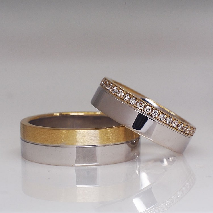 Trouwringen v224 in twee kleuren goud of platina met diamanten