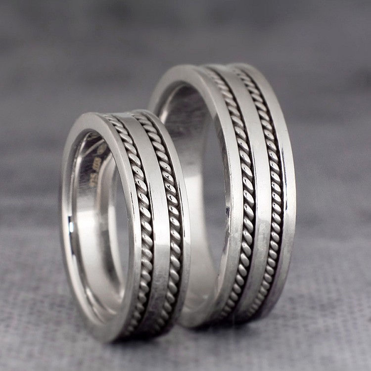 Wedding rings v353 in gold with manual braiding