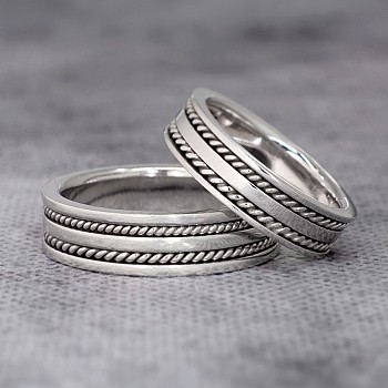 Wedding rings v353 in gold with manual braiding